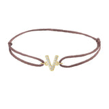 Diamond initial v silk bracelet in 14K yellow gold on brown silk