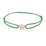 Diamond initial w silk bracelet in 14K rose gold on emerald silk