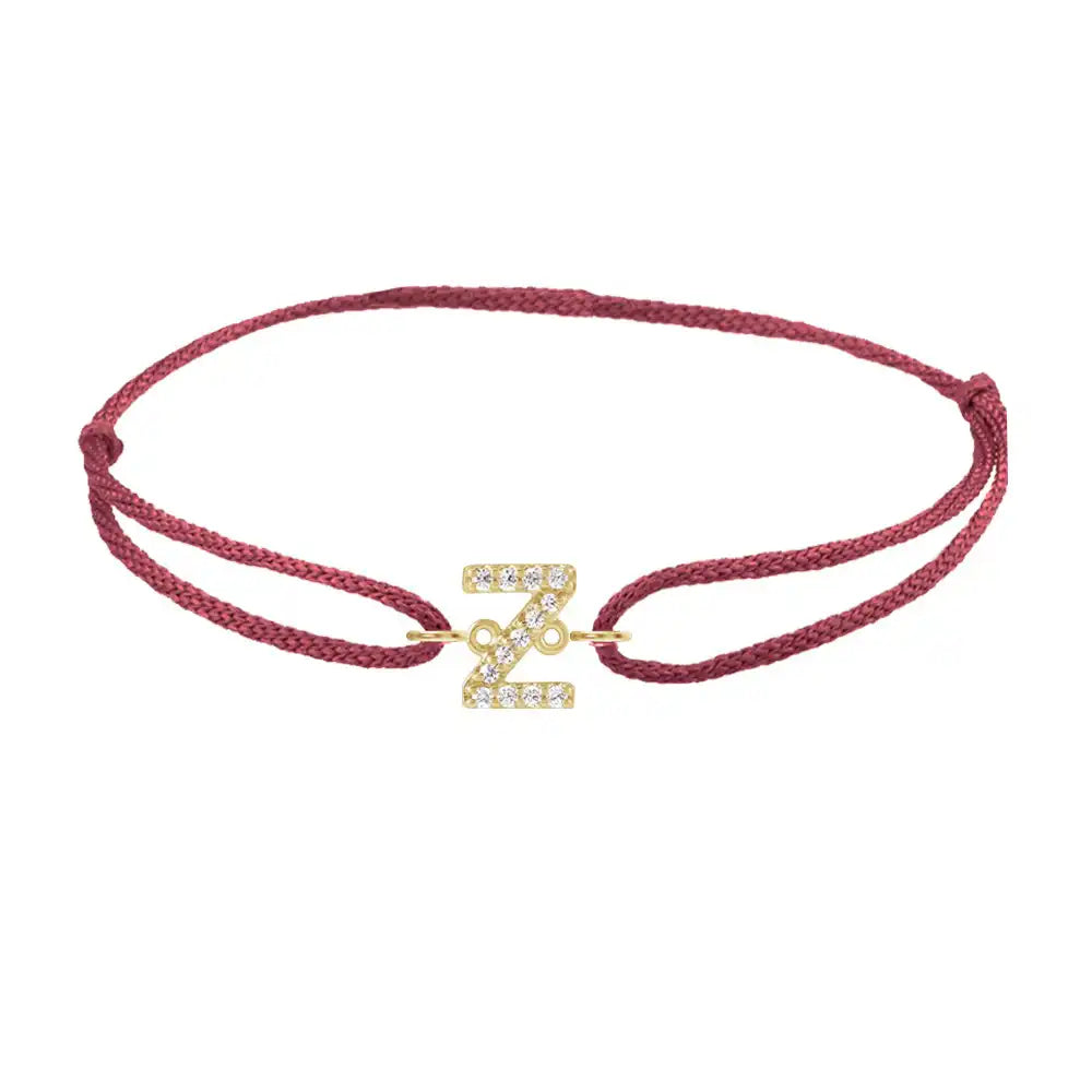 Diamond initial z silk bracelet in 14K yellow gold on burgundy silk