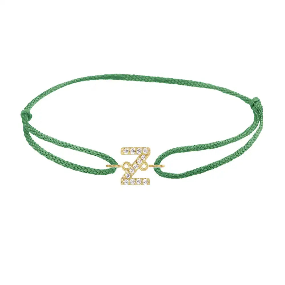 Diamond initial z silk bracelet in 14K yellow gold on emerald silk