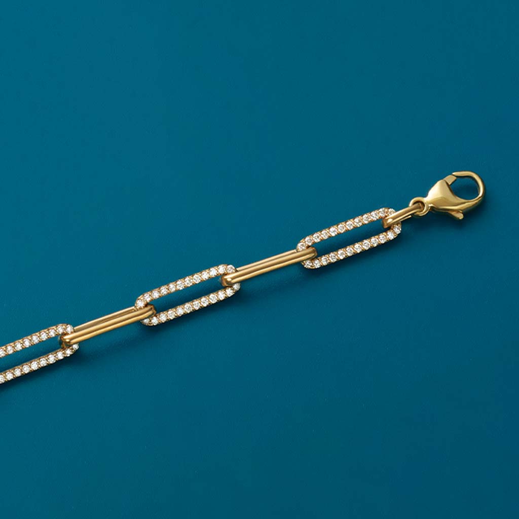 Diamond link bracelet in 14K yellow gold—flat lay on white, recycled gold, hand-set diamonds