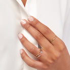 Diamond-Tipped Open Ring stacked with slim gold bands on hand, minimalist everyday styling