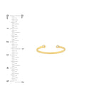 Diamond-Tipped Open Ring in 14K yellow gold with .02 CT natural diamond shown with ruler