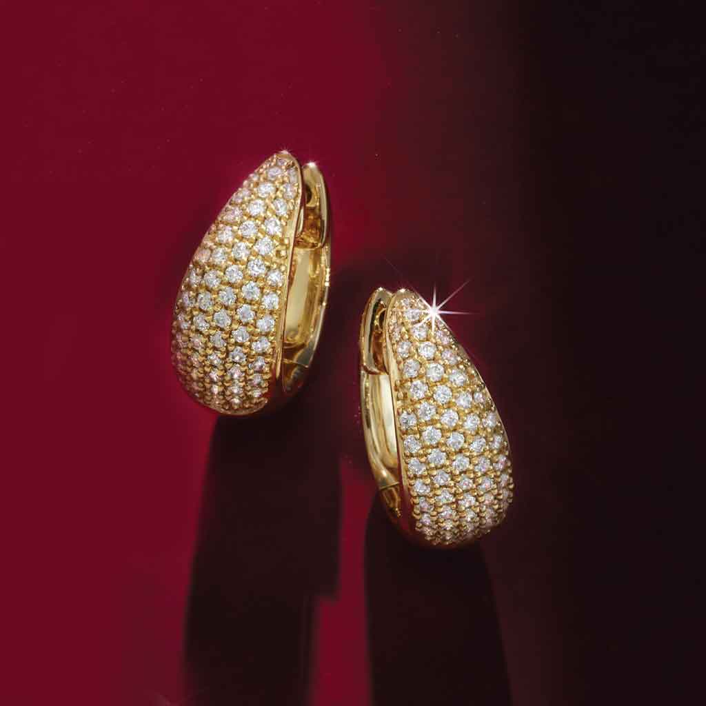 Diamond huggy hoop earrings in 14K gold with natural diamonds, front view