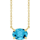 14K gold east-west necklace with oval aquamarine birthstone
