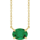 14K gold emerald necklace with horizontal oval setting