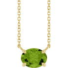 East-west peridot necklace in 14K yellow gold for August birthstone