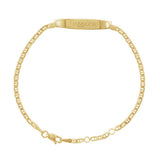 Engravable 14K gold ID bracelet on white background