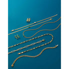 flat editorial shot gemstone gold jewelry