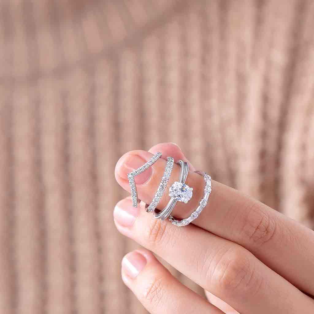 French-set diamond contour band showing curve designed to nest against engagement ring
