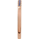 Detailed view of French-set alexandrite ring with subtle sparkle in rose gold