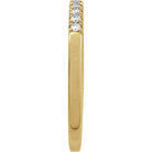 French-set diamond stacking ring in warm yellow gold side view