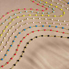 Bright enamel bead necklaces in several different colors