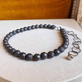 Hematite bead strand necklace, detail of reflective natural hematite surface variant--Hematite