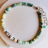 Peruvian opal bead strand necklace, detail of natural color variation in opal stones variant--Opal