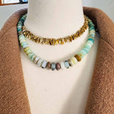 Peruvian opal beaded necklace on model, showing adjustable length at collarbone variant--Opal