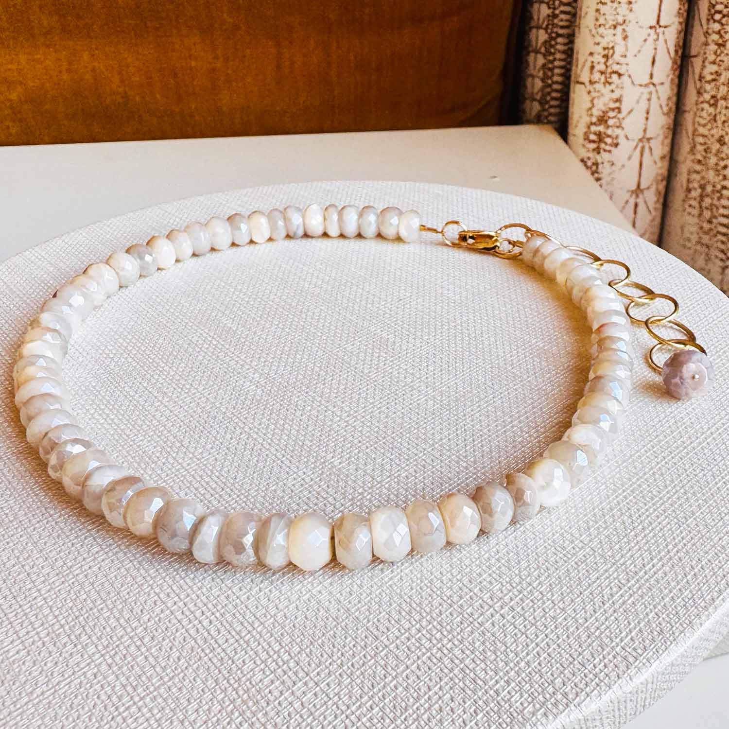 White sapphire bead strand necklace, detail of clarity and natural brilliance variant--White-Sapphire