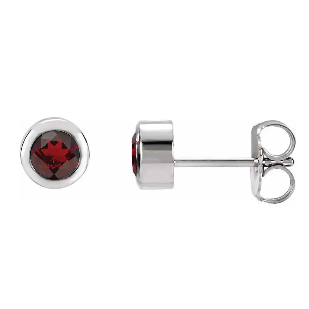 Garnet bezel stud earrings side view in sterling silver variant--Sterling-silver variant--Garnet