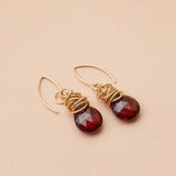 Garnet dangle earrings product shot, genuine deep red stone in sculptural bezel setting variant--Gold-fill variant--Sterling-silver variant--Garnet