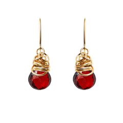 Garnet dangle earrings in 14K gold-fill, warm gold setting with deep red garnet gemstone