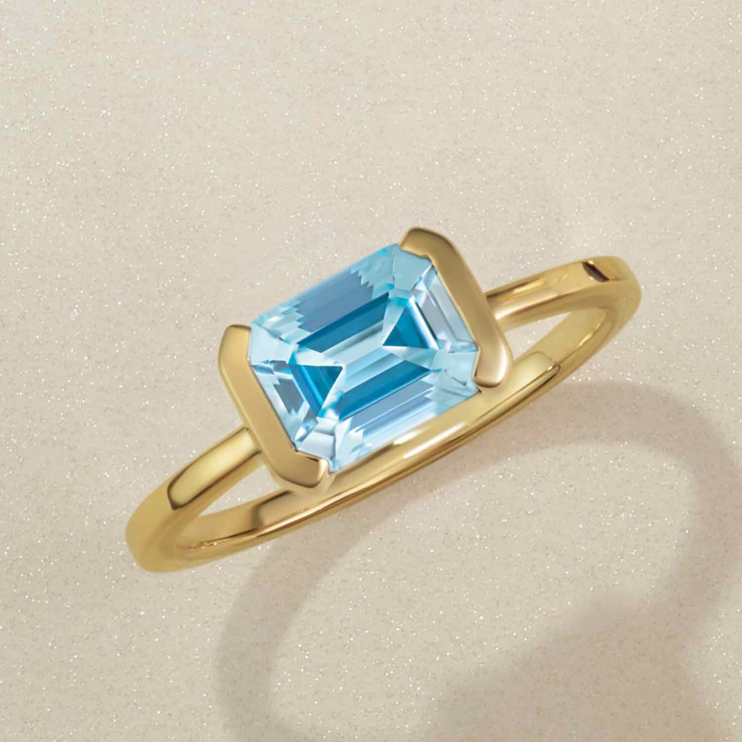 Gemmy tile cocktail ring with aquamarine emerald-cut stone in gold