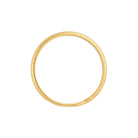 Side view of gold ribbed band