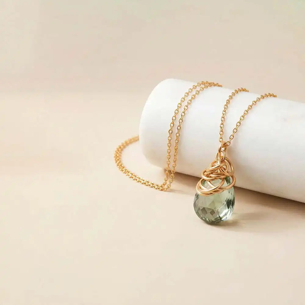 Natural green amethyst pendant necklace in sterling silver, styled on chain necklace