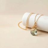 Natural green amethyst pendant necklace in sterling silver, styled on chain necklace