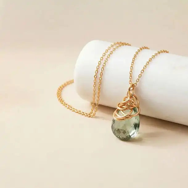 Natural green amethyst pendant necklace in sterling silver, styled on chain necklace