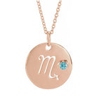 14K rose gold zodiac charm necklace for Scorpio, paired with a natural gemstone.