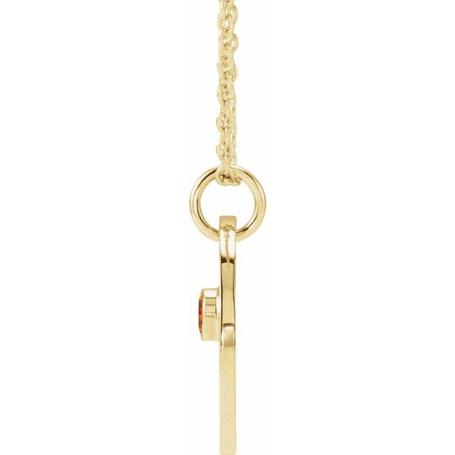 Handcrafted gold Virgo charm necklace featuring orange spessartite garnet side view
