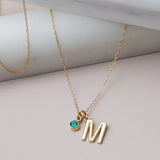 Gold initial and birthstone charm necklace