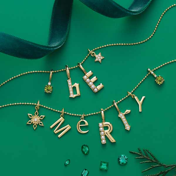 Modern initial charm, editorial styling on fabric