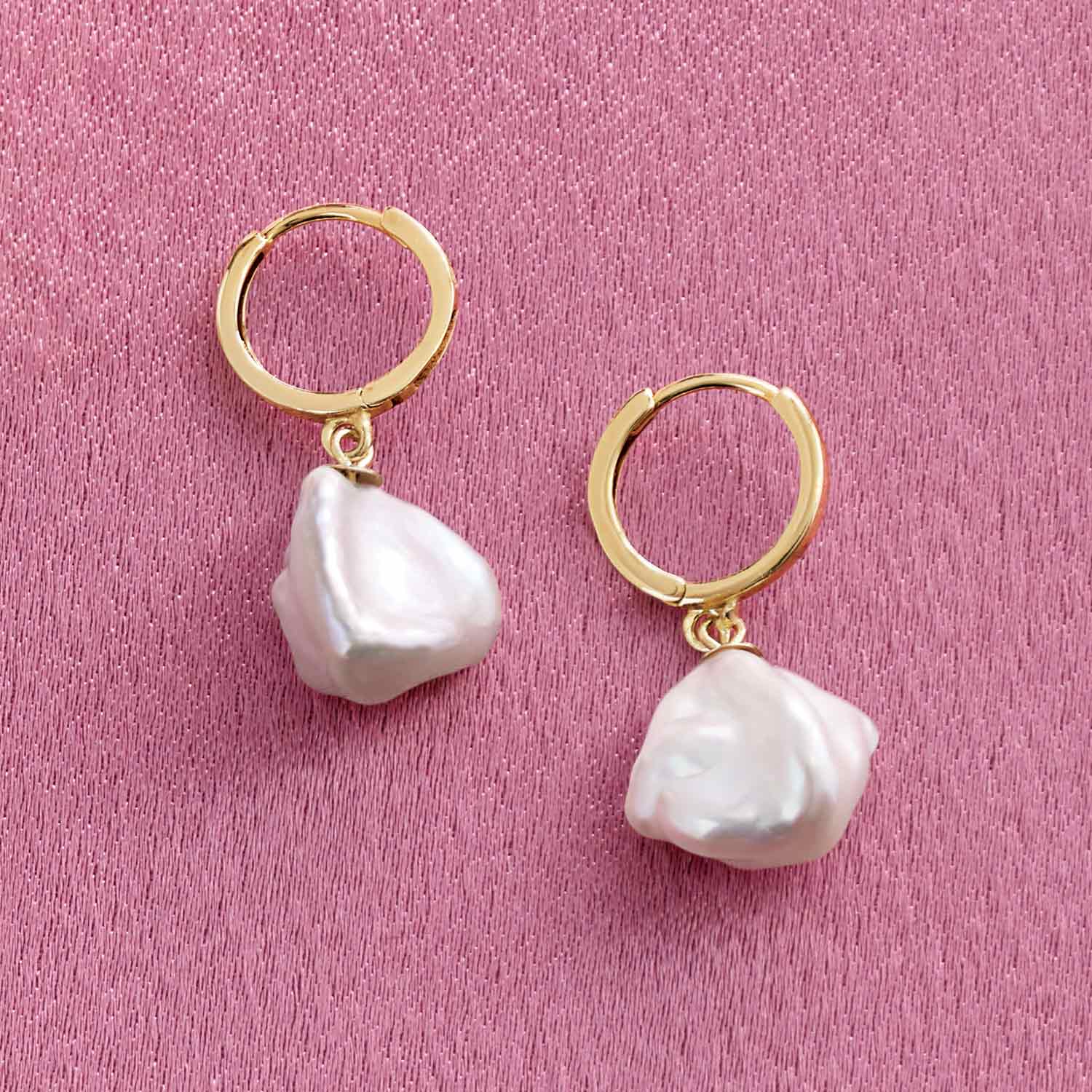 Keshi pearl hoop earring in 14K gold, close-up of pearl and hoop detail