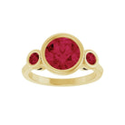 Handmade red ruby ring featuring 8mm center stone and two 3mm round accents