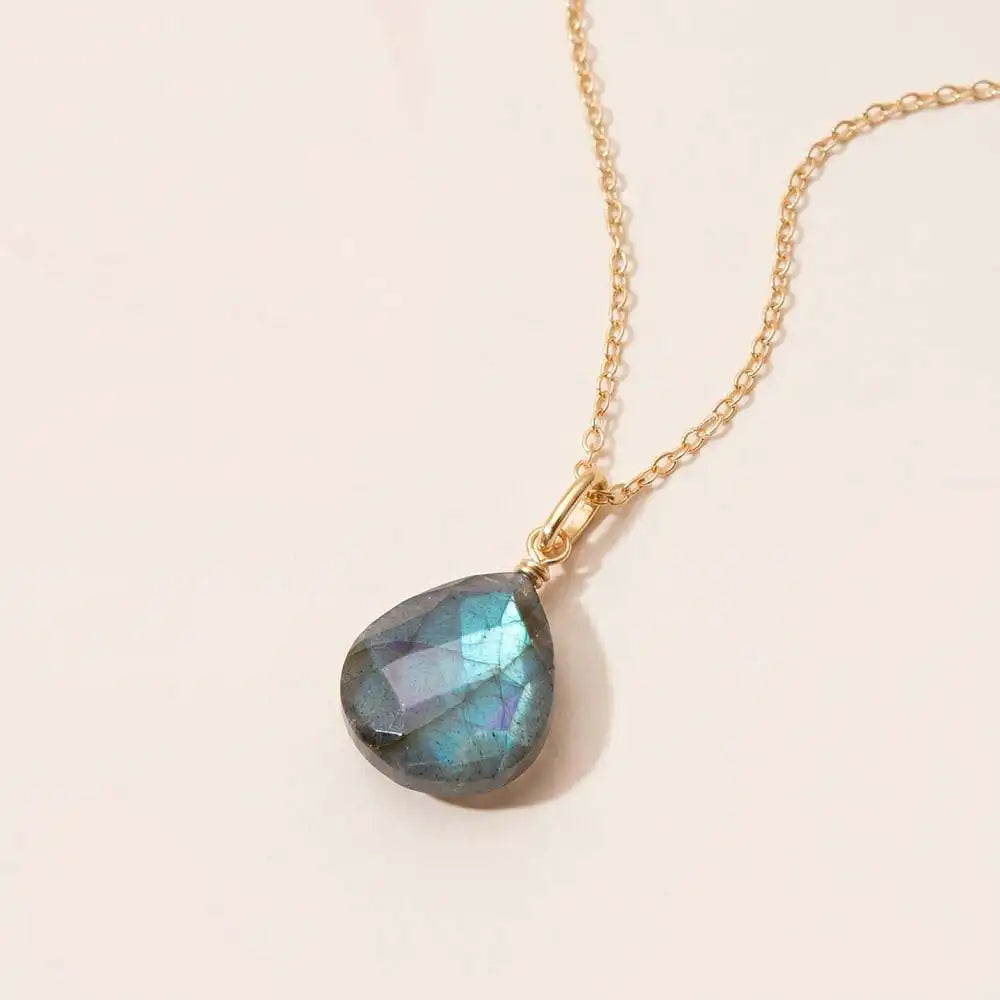 Natural Labradorite drop necklace, close-up product shot on neutral background