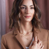 aries diamond talisman necklace layered on model