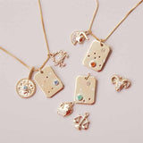 Leo constellation birthstone necklace with peridot and diamonds