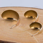 Lightweight curved gold hoop earrings for everyday wear