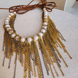 Pearl fringe necklace close-up of hand-knotted chain fringe detail