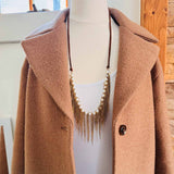 Lillian pearl fringe necklace showing adjustable leather tie clasp