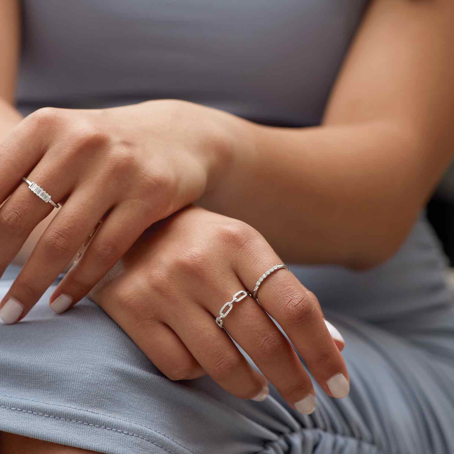 Diamond link ring in 14K white gold shown on model