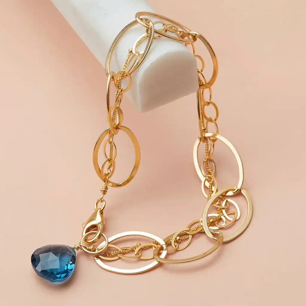 Natural london blue topaz woven chain bracelet in sterling silver, styled on chain necklace variant--Gold-fill variant--Sterling-silver variant--Oxidized-sterling-silver variant--London-Topaz