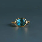 East-west London Blue Topaz cocktail ring in 10K gold