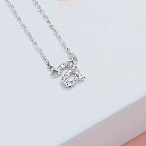 Diamond lowercase initial pendant necklace close up