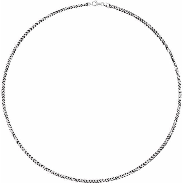 Styled shot of men’s oxidized sterling silver Franco chain necklace