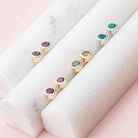 Birthstone bezel-set stud earrings in several birthstones perfect for a birthday