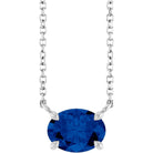 Sterling silver sapphire birthstone necklace with east-west prong setting