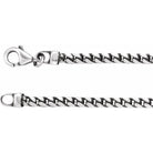 Close-up of oxidized silver Franco chain showing link detail