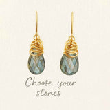 Paisley dangle earring design tool showing gemstone and metal selection options.
